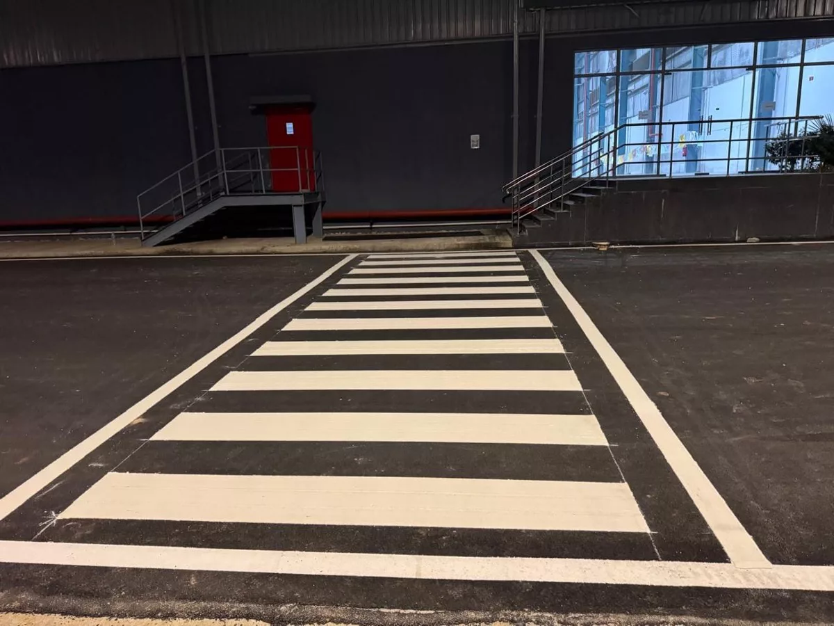 Zebra crossing marking at a warehouse facility